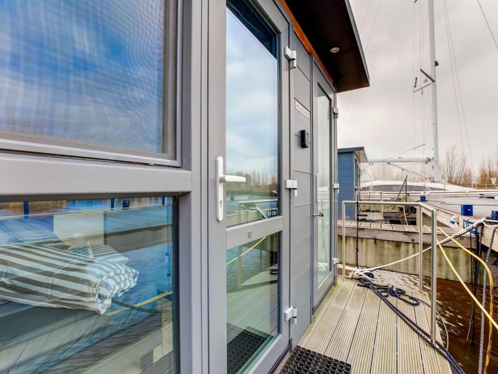Modern Houseboat In Marina Of * Volendam